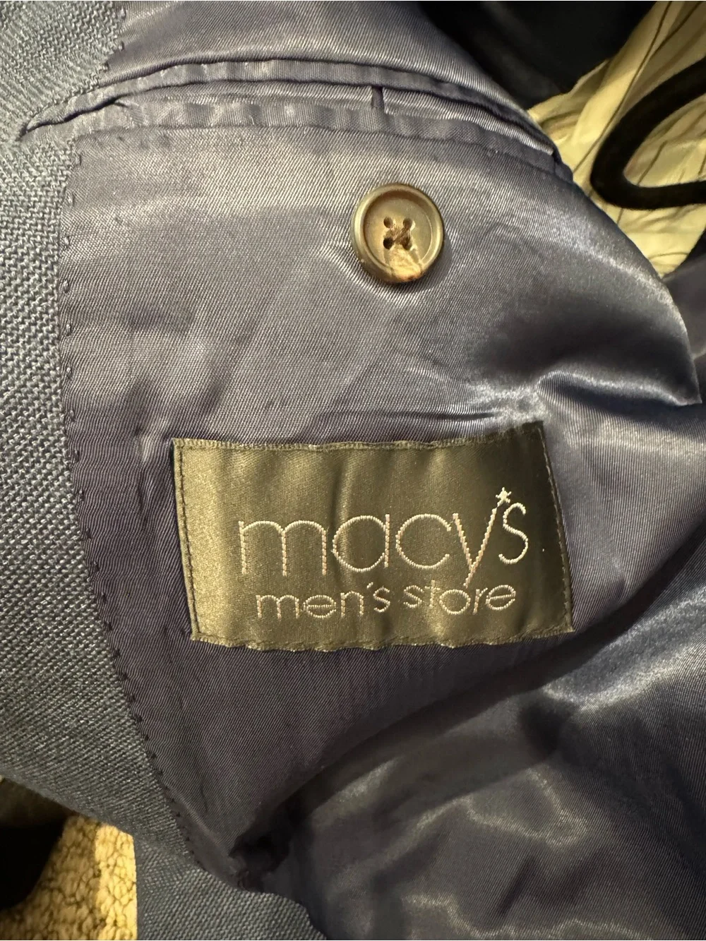 Lauren Ralph Lauren is a gray-blue suit jacket/blazer w/ classic 2button closure